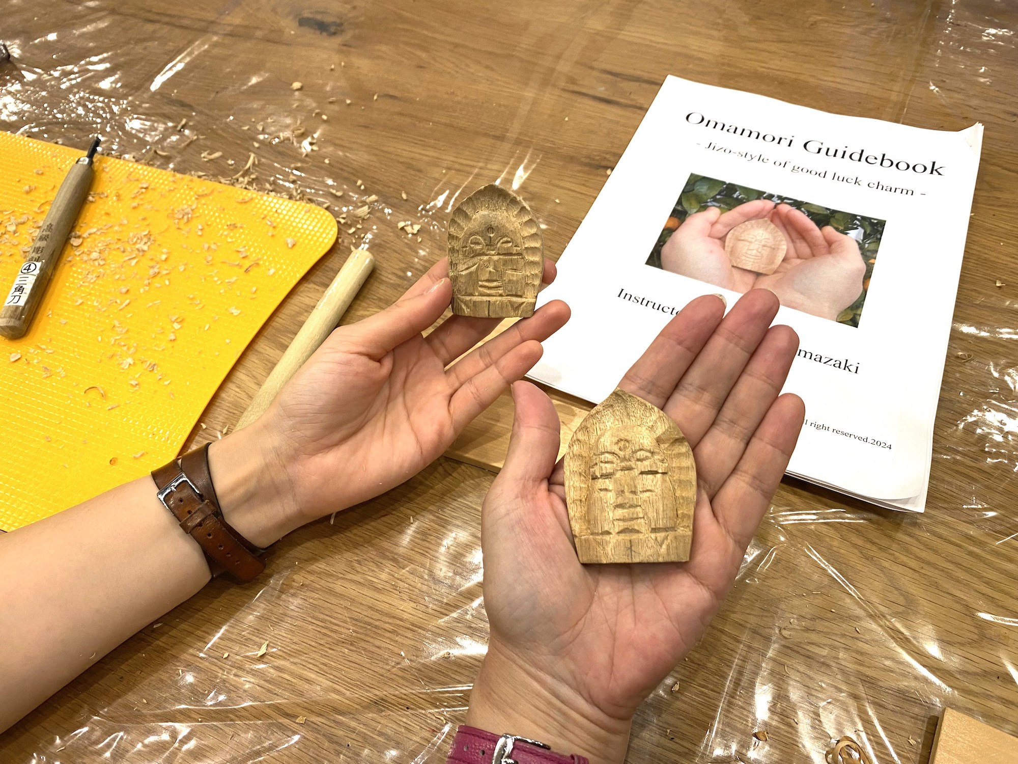 Hands-on Buddhist wood carving experience at a sacred site