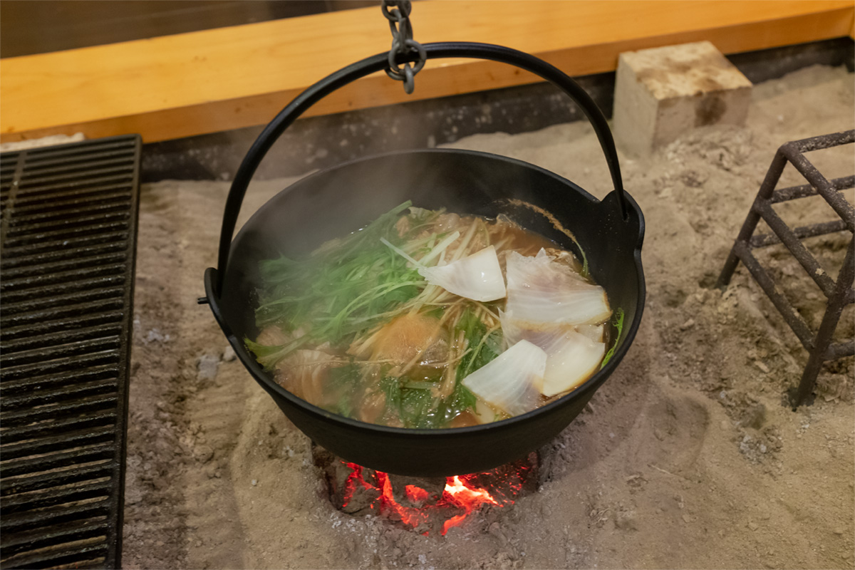 Nabe cooking over a fire in green tea farm experience